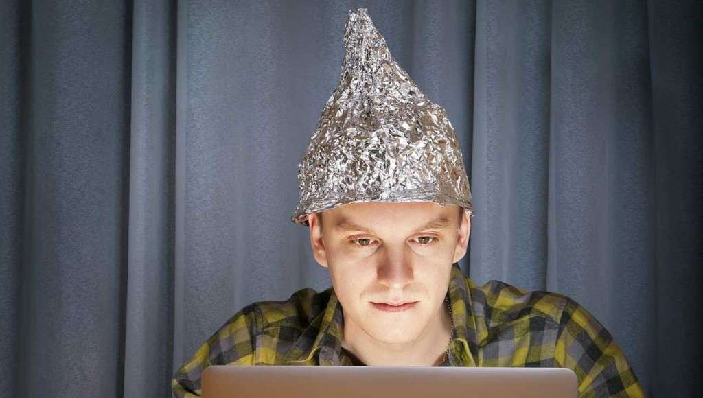 conspiracy theorist with tin foil in his head