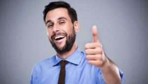 Man giving thumbs up because some bullshit study revealed he might be a secret genius.