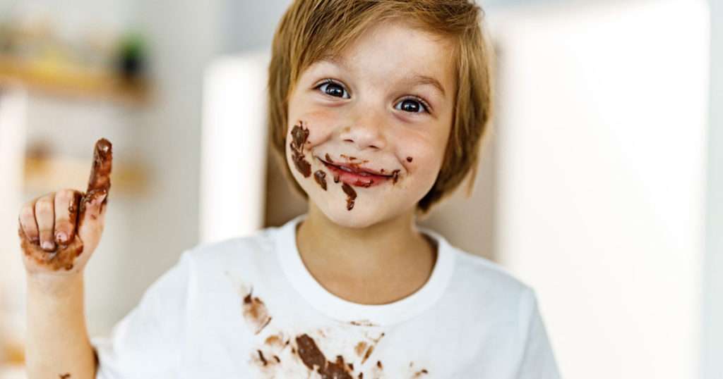 boy eating chocolate