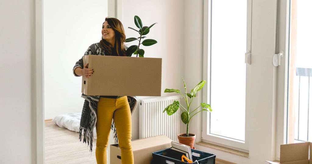 woman boxes moving house