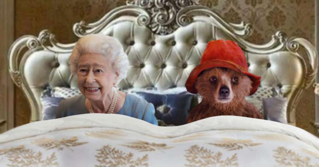 Queen in bed with paddington