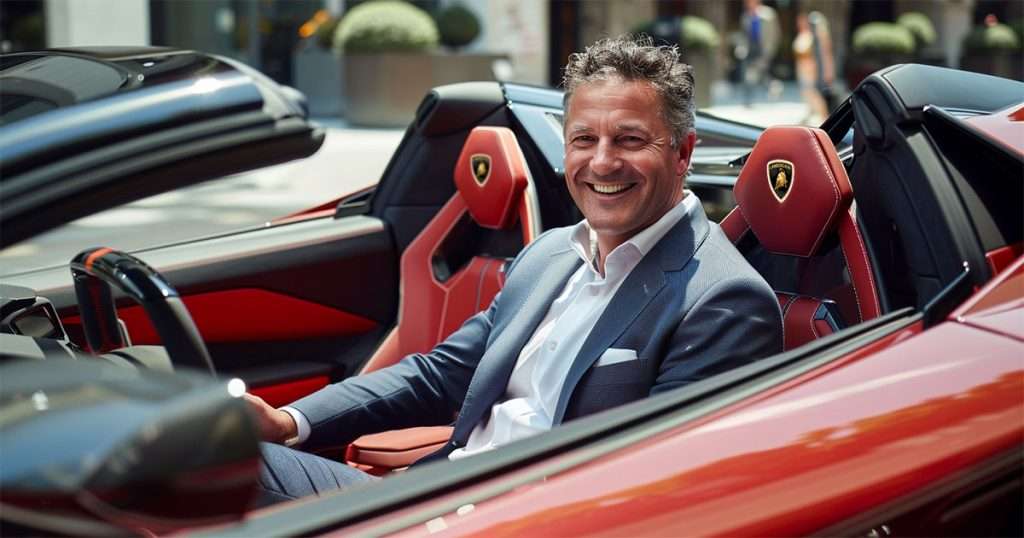 businessman driving a lambourghini