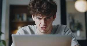 Incel angry on laptop