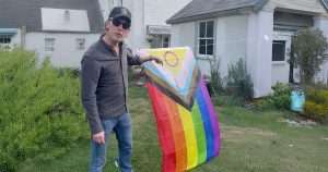 Laurence Fox burning a pride flag