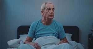 Nigel Farage sat up in bed
