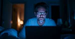 Pervert looking at computer