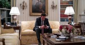 Man using phone in White House