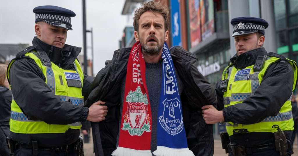 man arrested in half and half scarf