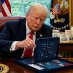Donald Trump playing battleship in the Oval Office.