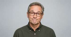 Man shrugging at criticism