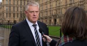 Lee Anderson answering questions outside parliament.