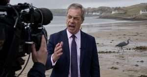 Nigel Farage protesting migrant heron