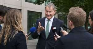 Rupert Lowe talking to reporters