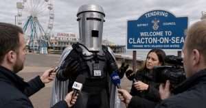 count Binface answering questions from reporters