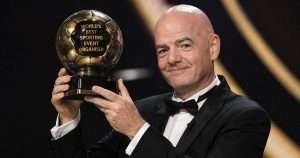 Infantino with sporting event organiser award