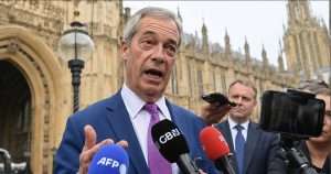 Nigel Farage talking to reporters.