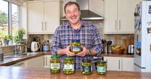 Gherkin fetishist in his kitchen