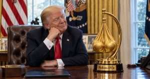 Trump with the Ballons D'Or trophy